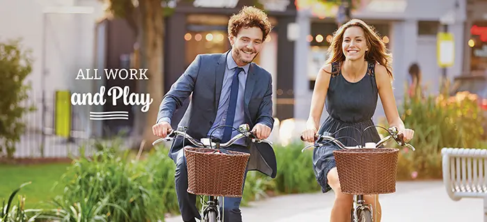 business casual riding bikes in the city